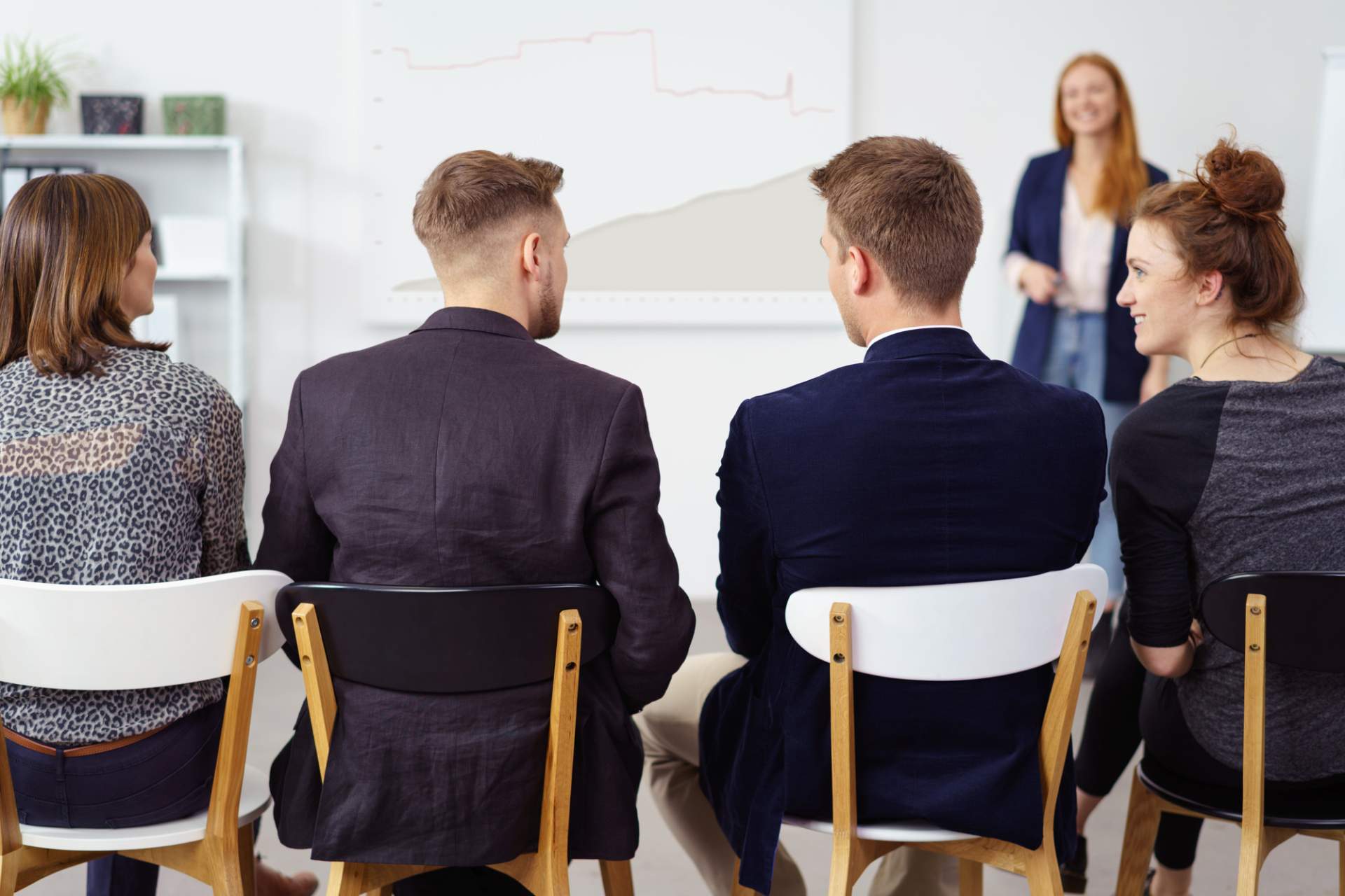 Group sitting in chairs attending a training